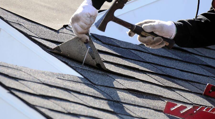 Expert tile roof repair services in Clinton, IL